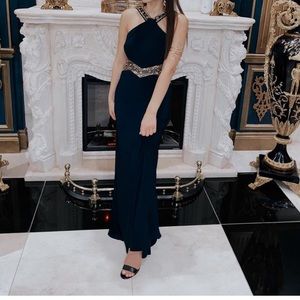 Elegant evening gown in navy with gold detailing